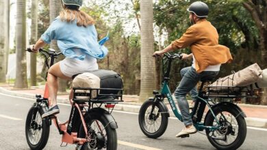 Electric bikes for commuting with step-through frame and integrated battery on urban street