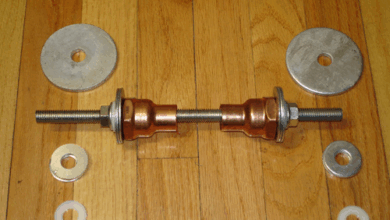 Large washers, a piece of 3/8″ threaded rod (sometimes referred to as "allthread") & a pair of flange nuts. 