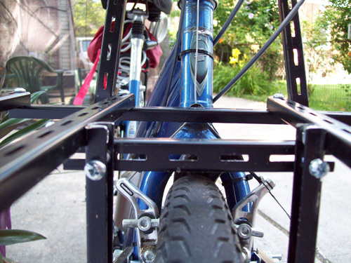 6. Make the uprights that hang from the handlebars. I cut and bent the end to allow the two surfaces to meet better.