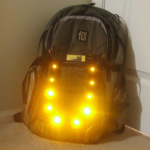 Backpack Bike Light attached to a backpack with bright LED lights for nighttime cycling visibility.