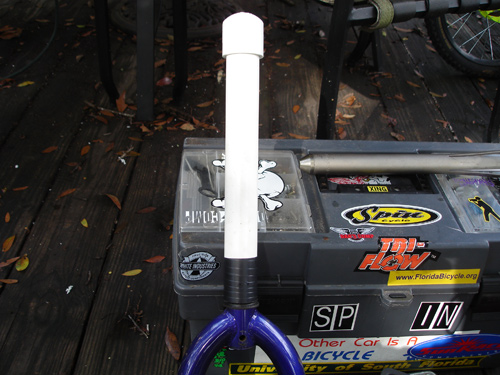 Those stubborn fork crown races? Well, back to the plumbing department — you’ll need a length of PVC pipe and a plastic endcap.