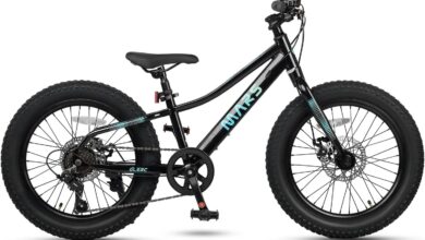 Best beginner mountain bikes featuring low-slung hardtail frame with wide knobby tires for trail riding