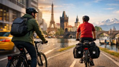 Bike commuter transitioning into travel cycling while riding through an international city showing how bike commuting to travel cycling creates global cycling experiences