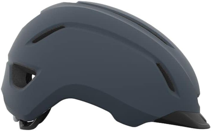 Best bike helmets Giro Caden II shown on casual rider navigating neighborhood bike path in morning light
