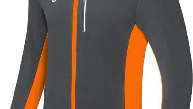 Dark gray and orange cycling jacket with full front zip, high collar, and streamlined fit, designed for comfort, visibility, and weather protection as one of the best jackets for bike commuting.